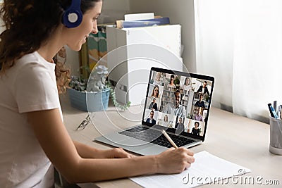 Female employee have webcam digital meeting with colleagues Stock Photo