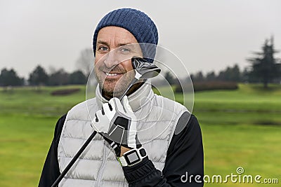 Close up of golf player with drive in hand at a golf course Stock Photo