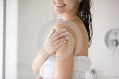Close up of woman touch healthy soft skin after shower Stock Photo