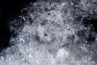 Close-up of snowflakes in winter. Snowflakes look like stars Stock Photo