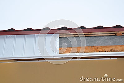 Close up on Soffit and Fascia Installation. New House Roofing Construction. Stock Photo