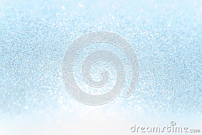 Close up soft blue Paper Glitter bokeh abstract background Stock Photo