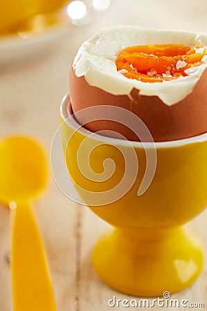 Close-up on soft-boiled egg in eggcup Stock Photo