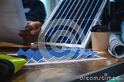 Close-up Solar Farm Sample Model on Desks While Meeting and Discussions Stock Photo