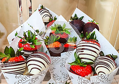 Godiva indulgent gourmet chocolate on display with strawberries at Meadowhall, South Yorkshire, UK Editorial Stock Photo