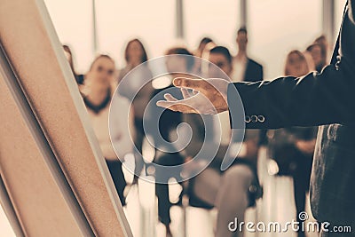 close up. the speaker makes a report for the business team Stock Photo