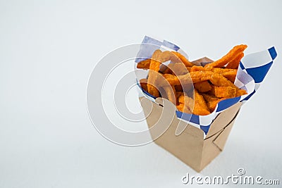 Close up of spicy French fries in carton box Stock Photo