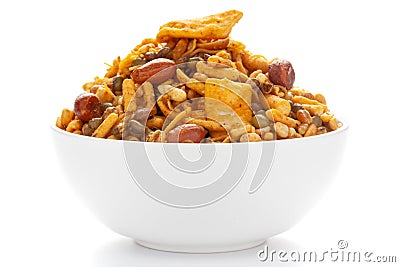 Close up of spicy Ratlami mixture Indian namkeen snacks on a ceramic white bowl. Stock Photo
