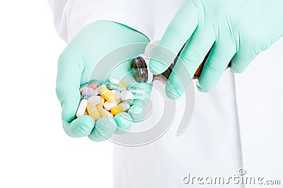 Close-up of spilling a bottle of colored pills Stock Photo