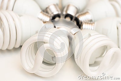 Close-up spiral saving bulbs on white background Stock Photo