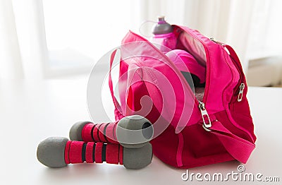 Close up of sports stuff in bag and dumbbells Stock Photo