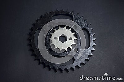 Close up sprocket gear on black background Stock Photo