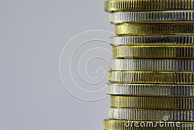 Close-up stack golden and silver coins Stock Photo