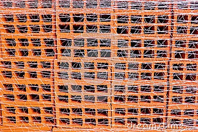 Close-up of a stack of packed bricks, to use as background in architectural themes Stock Photo