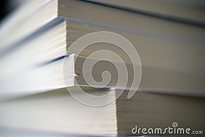 Close-up of a stack of various books. Stock Photo