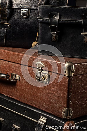 Close-up of a stack vintage shabby suitcases Stock Photo