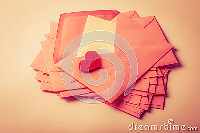 Close up Stacking of pink envelopes and mail letter paper and th Stock Photo