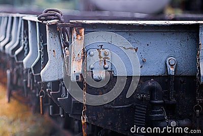 Close up Steel railroad fasteners.Iron nuts fastened to railway tracks.Rusty old iron freight train In the train station, Thai Editorial Stock Photo