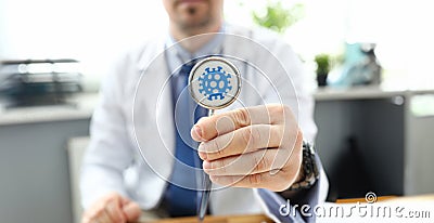 Person holding medical device Stock Photo