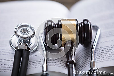 Close-up Of Stethoscope And Gavel Stock Photo