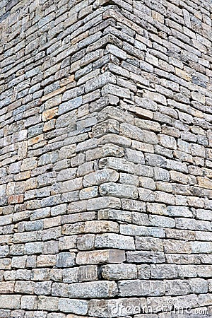 Close-up of stone wall use for construction business and designers. Stone backgrounds textured pattern abstract image. Stock Photo