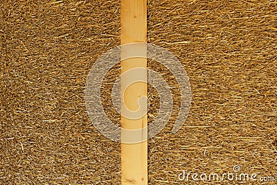 Close-up of straw-wooden detail at construction of ecological renewable low energy sustainable wooden eco house. Stock Photo