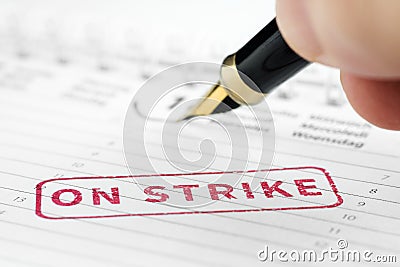 Close up of on strike stamp Stock Photo