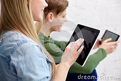 Close up of students with tablet pc at school Stock Photo