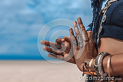 close up of stylish tribal dancer hands. woman in oriental costume outdoors Stock Photo