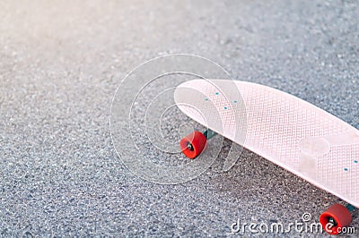 Close Up surf skate pink or skateboard on a skate park extreme sports. Concept family activity lifestyle of the new generation for Stock Photo