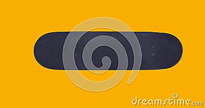 Close up surface black skateboard isolated on yellow background, flat lay, top view Stock Photo