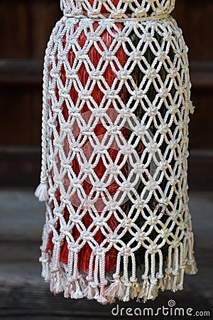 Close-up of Suzu bell rope at a Shinto shrine Stock Photo