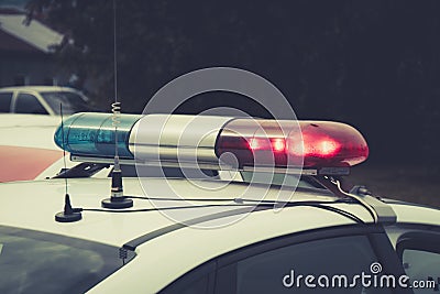 Close up of a swithched rotating beacon of a police car. The top of the police patrol car with flasher and antennas. A patrol car Stock Photo