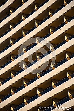 Close up of symmetrical pattern of balcony`s on a big residential building Stock Photo