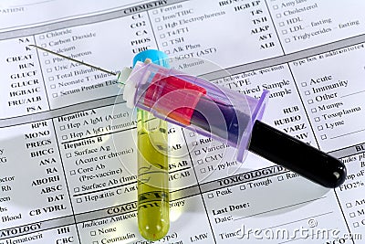 Close up of syringe with test tube Stock Photo