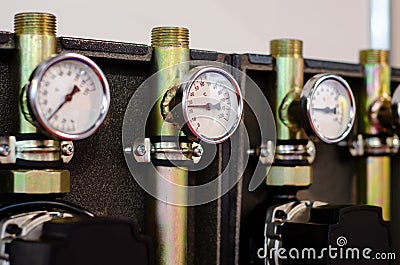 Close up of system with many steel pipes, manometers and pump Stock Photo
