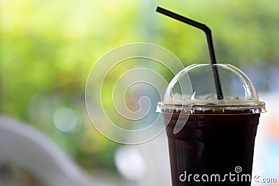 Close up of take away plastic cup of iced Americano Stock Photo