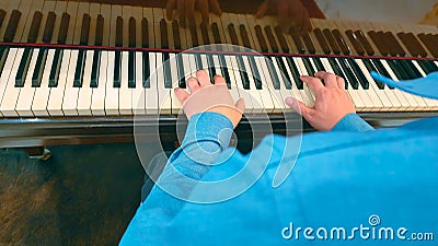 Close up Talent and virtuosity back view of man pianist hands on a grand piano keyboard Stock Photo