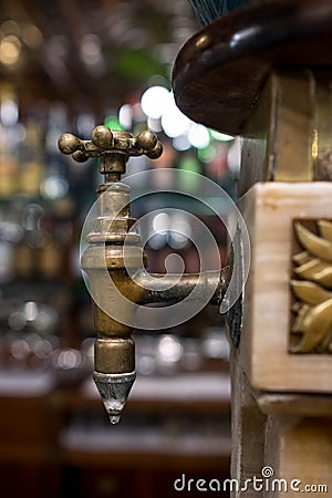 Close up tap in the interior of the historic coffee shop, Cafe Mulassano, Turin Italy. Cafe is decorated in Art Nouveau style. Editorial Stock Photo