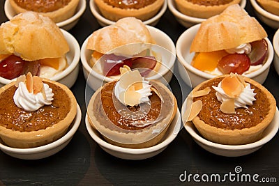 Close up of Tasty Miniature Decorative Desserts Stock Photo