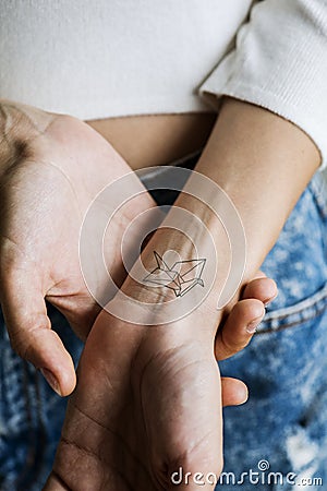 Close up of tattoo on woman`s wrist Stock Photo