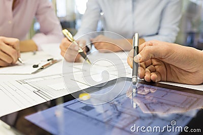 Close-up of Team architects working on construction project in o Stock Photo
