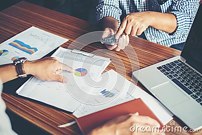 Close-up of Team Business people discussing a financial plan at Editorial Stock Photo