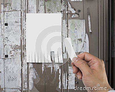 Close up of tear off advertising contact information Stock Photo