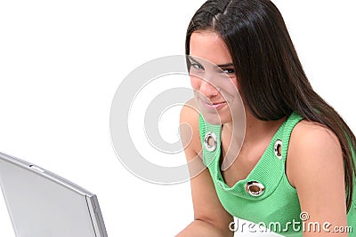 Close Up Of Teen Laying On Floor With Laptop With Grin Stock Photo