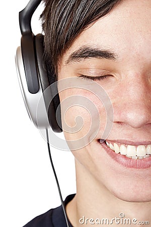 Close-up teenager listen to music with headphone Stock Photo