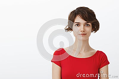Close-up tender feminine motivated charming lgbtq woman short pixie haircut stand red summer t-shirt look assertive self Stock Photo