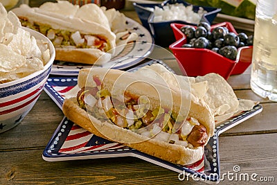 Summer holiday picnic with hot dogs and chips Stock Photo