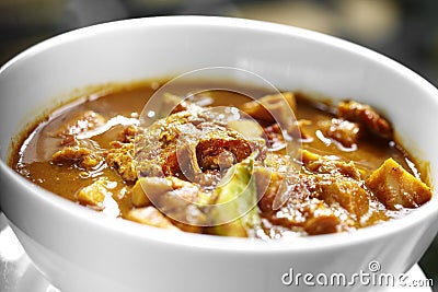 Close up thai spicy yellow fish curry Stock Photo
