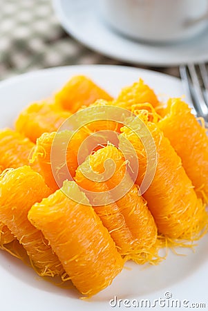 Rolled egg yolk thread or Thai style Fios de ovos Stock Photo